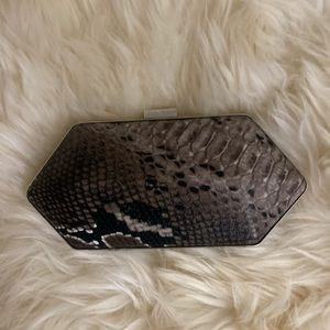 small snakeskin clutch bag